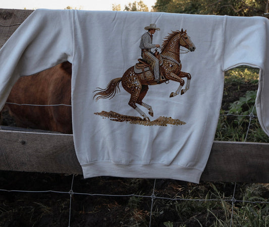 THE RHINESTONE COWBOY